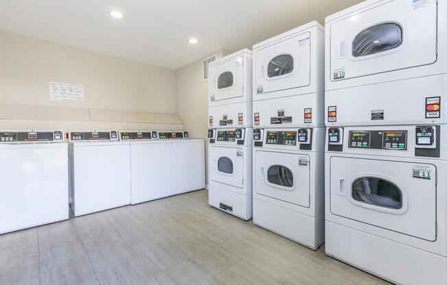 a kitchen with a sink and a refrigerator