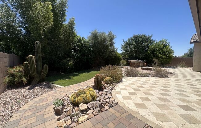 Spacious 4-Bedroom + Den, 4-Bath Home in Queen Creek Station with Dual Master Suites