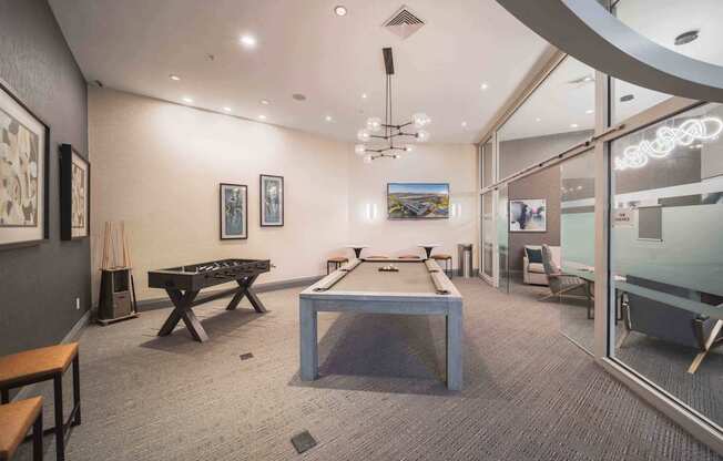 A room with a pool table and a TV mounted on the wall at Harbor Pointe Apartments, Bayonne, NJ, 07002