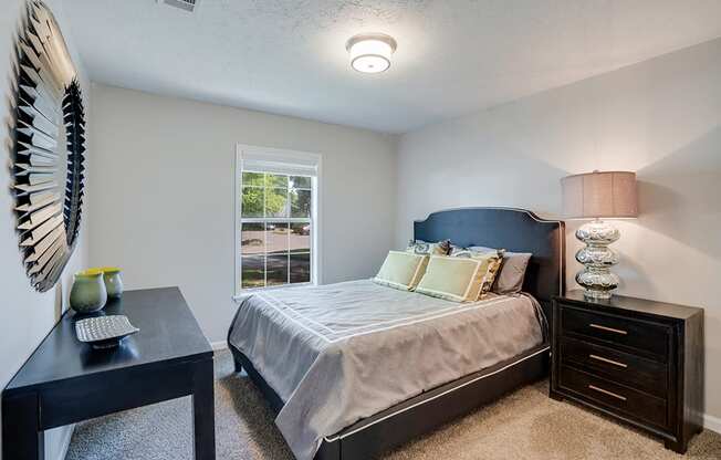 Bedroom with Tall Ceilings and Large Window