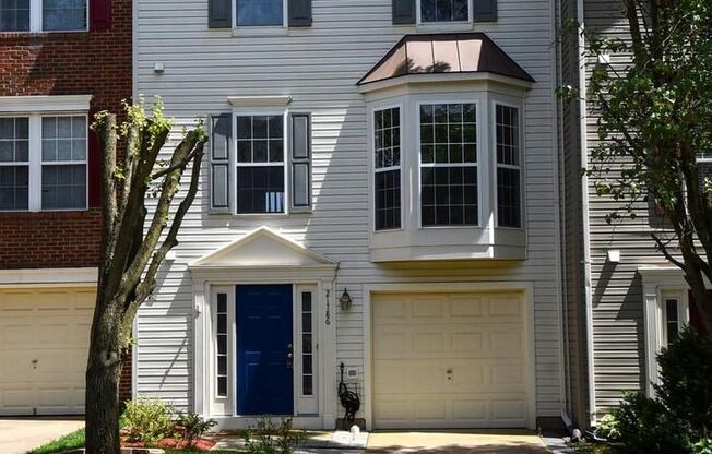 Beautifully updated townhome with an attached one-car garage.