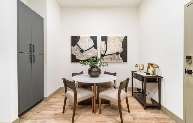 Dedicated dining areas provide a comfortable setting for meals, entertaining, or working from home, complemented by contemporary finishes and wood-style flooring.