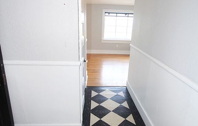 CHARMING 3 BEDROOM TUDOR REVIVAL APARTMENT W/ PUGET SOUND VIEWS