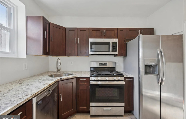 Modern 3-Bedroom Rowhome with Backyard Patio in Point Breeze — Accepting ALL PHA voucher holders