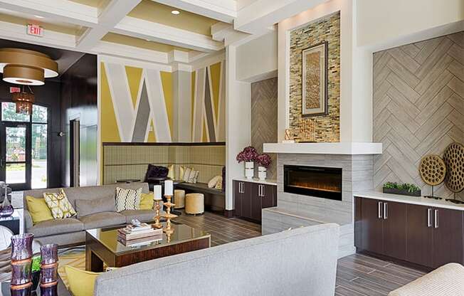 Clubhouse with seating and fireplace