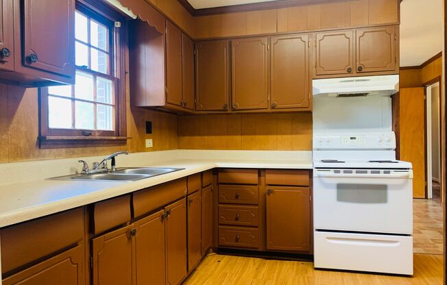 Welcome home! 3 bed, 1.5 bath, newly renovated, brick exterior, carport, hardwood flooring, private lot, must see!