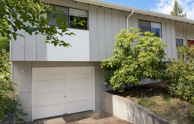 Beautiful Split-Level Home with Fireplace, Deck, Garage, and EV Charger