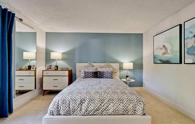 Two-Bedroom Apartments in San Jose, CA- Villas Willow Glen- Wall-to-Wall Carpeting with Green Accent Wall and Large Mounted Wall Mirror