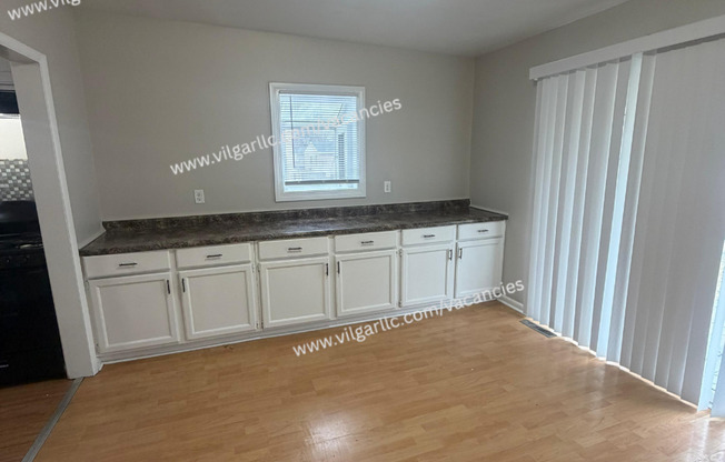 4 Bedroom • 2 Full Bath • 2-Car Garage • Fenced in Yard • Bonus Rooms • Appliances present