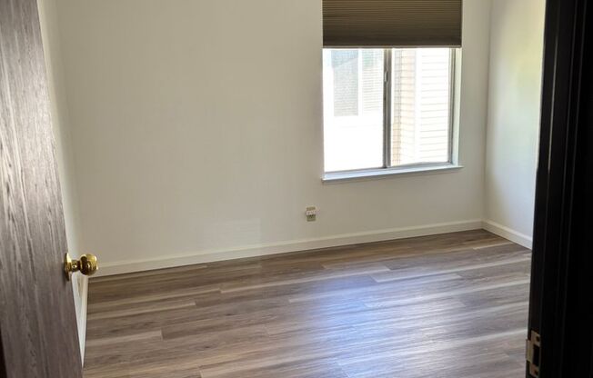 VERY NICE 2 BED/1 BATH 2ND FLOOR CONDO - NEW PAINT AND VINYL FLOORING THROUGHOUT