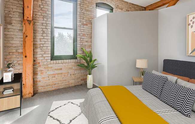 A bedroom with a bed, a nightstand, a lamp, a potted plant, and a painting on the wall.