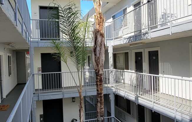 Inner gated courtyard with pleasant ambiance at the Atrium Apartments in downtown San Diego, California.