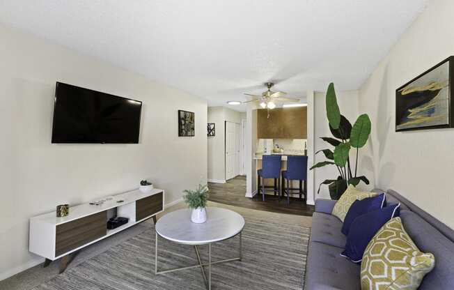 a living room with a couch and coffee table at Pacific Park Apartment Homes, Edmonds, 98026