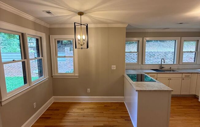 Welcome to Newman Manor – Where Timeless Charm Meets Modern Living!
