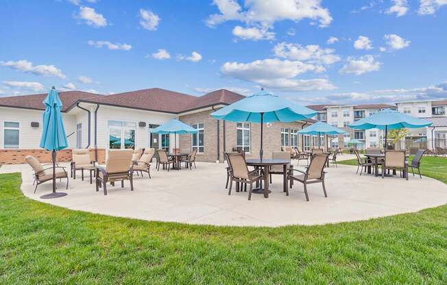 A sunny day at the outdoor seating area of a building.