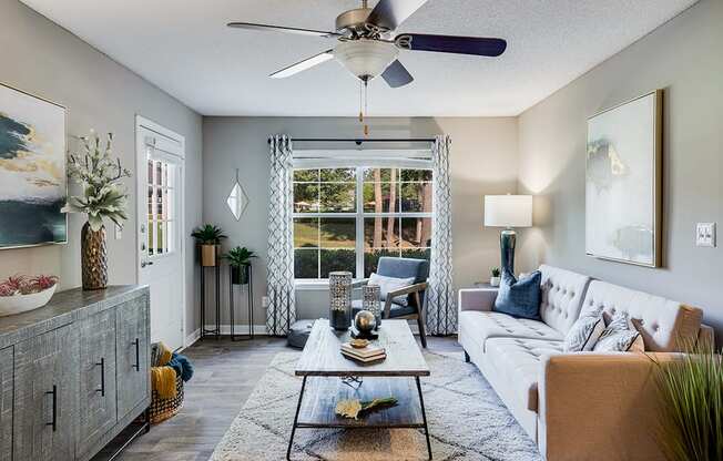 Living Room with Lots of Natural Light and Hardwood Style Flooring