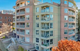 Bright 6th Floor Capitol Hill Condo | Parking Included | 2 Weeks Free