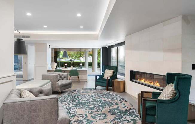 a living room filled with furniture and a fireplace