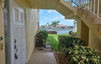 First Floor End Unit  2/2 Waterfront Condo at a GREAT Value!!  LOCATION LOCATION LOCATION