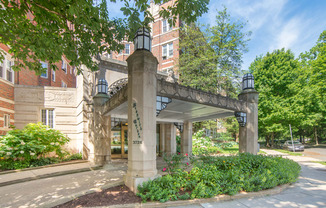 a view of the front of a building with a covered entrance