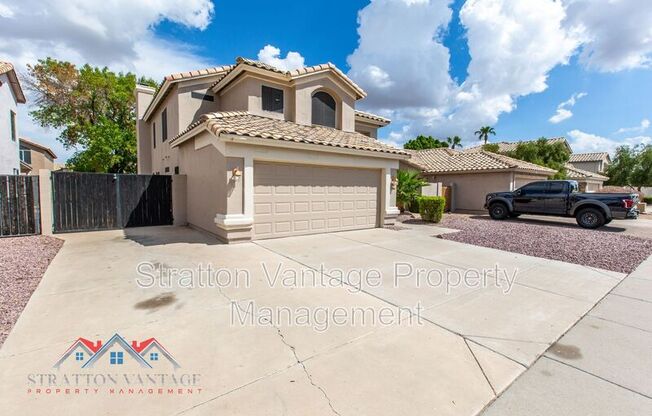 7420 W LOS GATOS DR