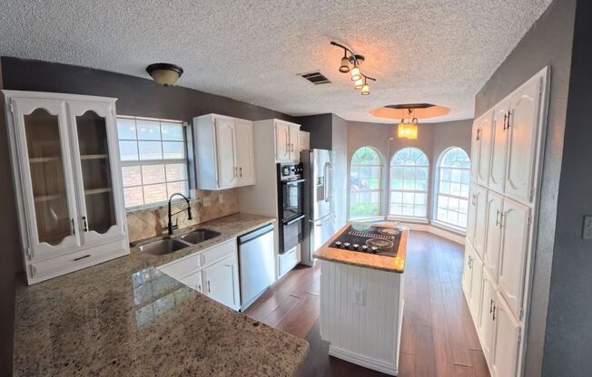 Updated 4-Bedroom Home with See-Through Fireplace & Covered Patio | Lancaster ISD - 1454 Cromwell Ct Lancaster, TX 75134