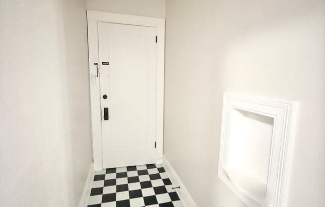 Unique Downstairs 1/1 w/ Hardwoods in Small 1920's Complex