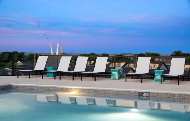 Pool at night at Trove Apartments, Virginia