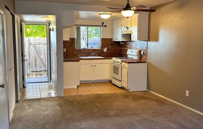 NEW CARPET!! 2 bedroom and 1.5 bath two story home with a garage and close to Camp Pendelton W/S/T included!