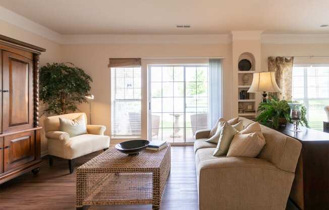 This is a photo of the living room in the 2 bedroom, 2 bath Islander floor plan at Nantucket Apartments in Loveland, OH.