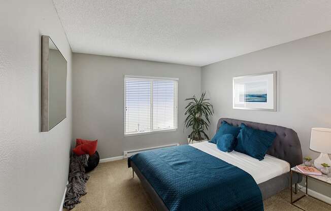 furnished bedroom interior at OceanAire Apartment Homes, California