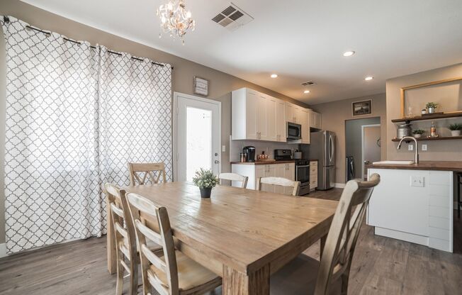 4 bedroom remodeled home with oversized lot and covered patio!