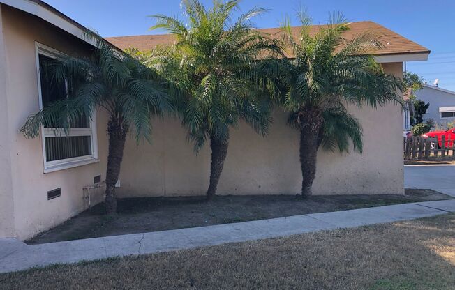 4 bed 2 bath house with large backyard, 2 car garage & laundry hook ups