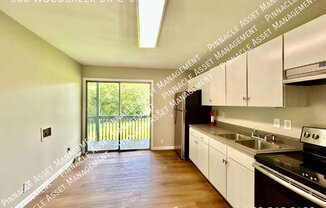 305 WOODCREEK DR
