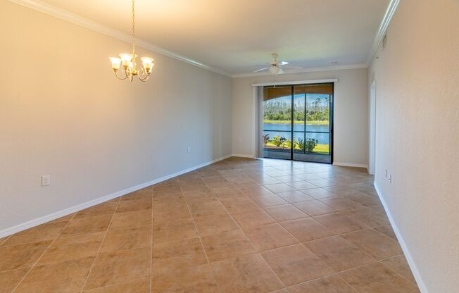Stunning 2BR/2BA Acqua Ct. First-Floor Unit with Lake Views in Treviso Bay – Resort-Style Living Awaits!