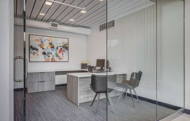 Leasing office with desk, chairs and artwork at Harvest, Salt Lake City, 84103