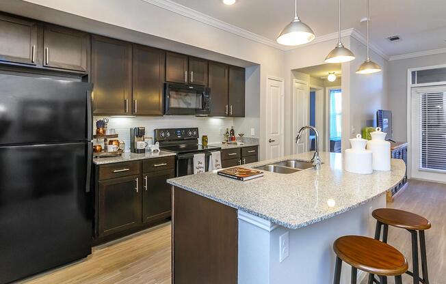 a modern kitchen with stainless steel appliances