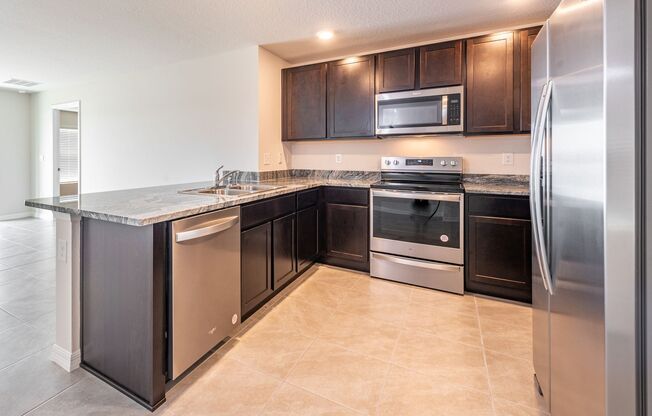 3 bedroom 2 bathroom 2 car garage home with pond view