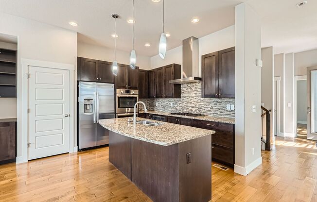 Beautiful- Open Concept - Updated - Main floor Primary BR - EV Plug in Garage- Solar Panels- Great Location!