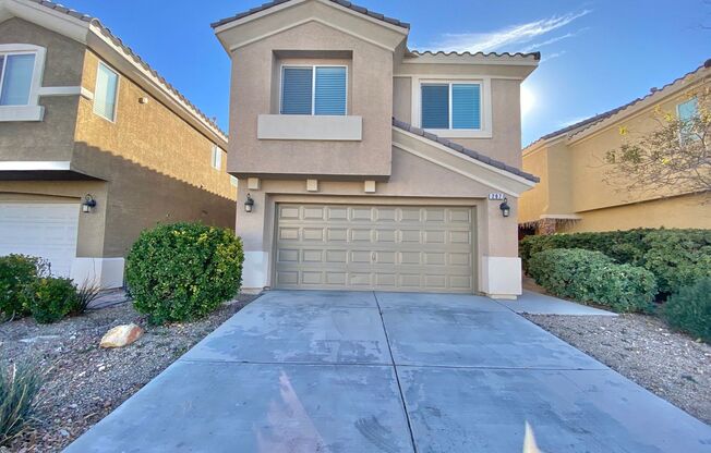 STUNNING 2 STORY HOME IN A GUARD GATED COMMUNITY!  LOCATED IN RHODES RANCH GOLF COURSE! 4 BEDROOM AND 3 FULL BATH READY FOR MOVE IN!