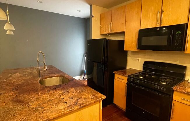 Modern Bi-Level 1st Fl. 2 Bed, 2 Bath Northern Liberties Condo w/ one parking space, C/A, W/D, H/W Fls and more!