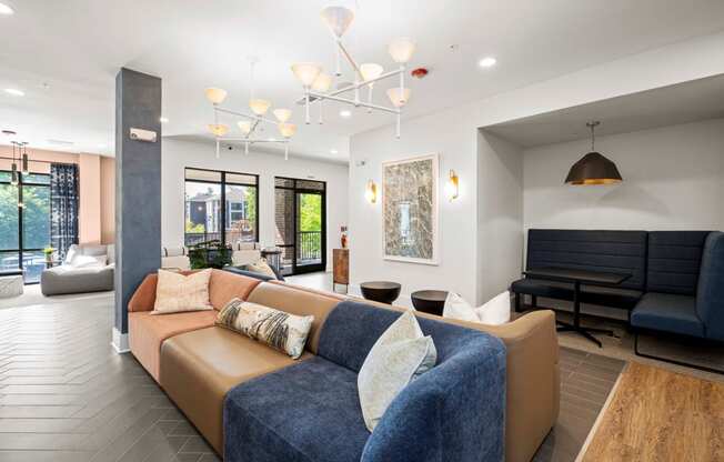 a living room with a couch and a piano