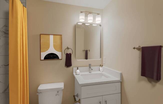 A bathroom with a toilet, sink, mirror, and a yellow curtain.