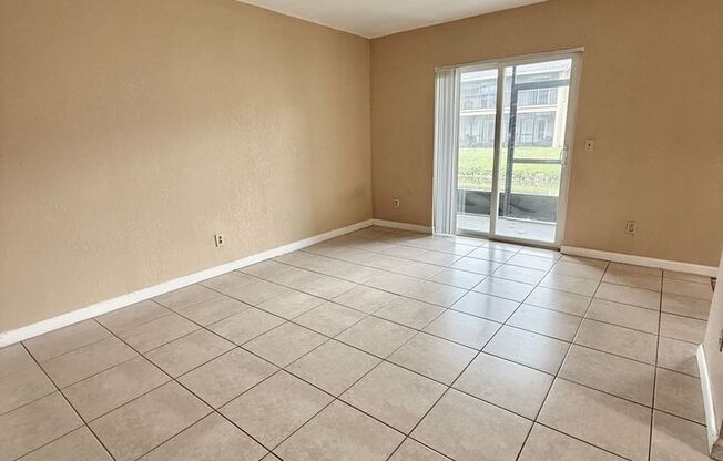 Spacious first-floor 2-bedroom, 2-bath condo in the desirable Hawthorne Village community