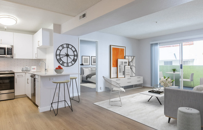 Kitchen and Living Room with Hard Surface Flooring and Patio