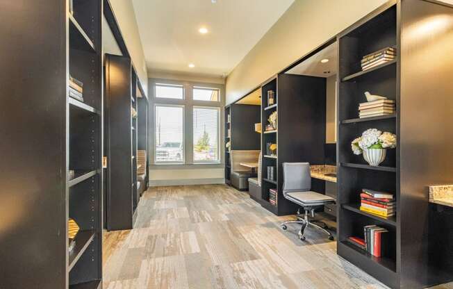 a large bookshelf in a room with a window