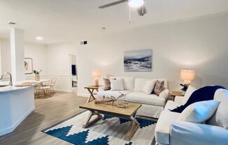 living room with a couch and a table at Mainstreet Apartments, Florida, 33756