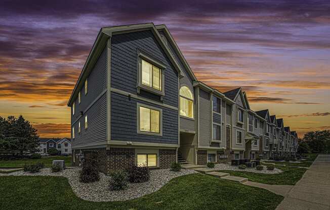 sunset view of apartment building at The Crossings Apartments, Michigan, 49508