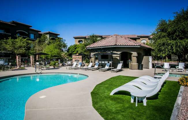 The Presley at Whitney Ranch Apartments Pool Area and Lounge Chairs