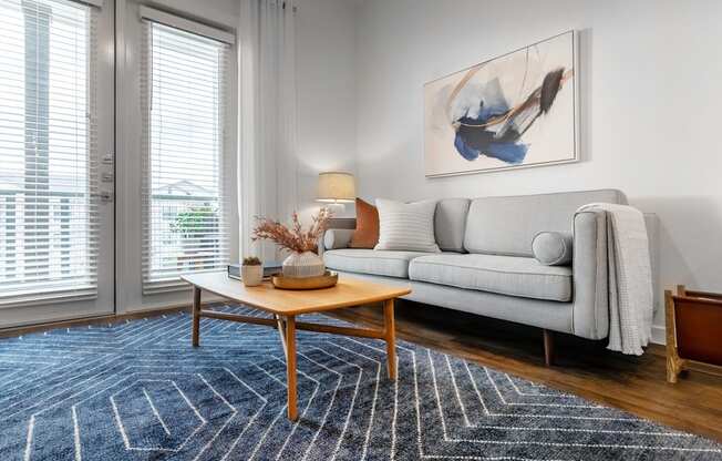 a living room with a couch and a coffee table